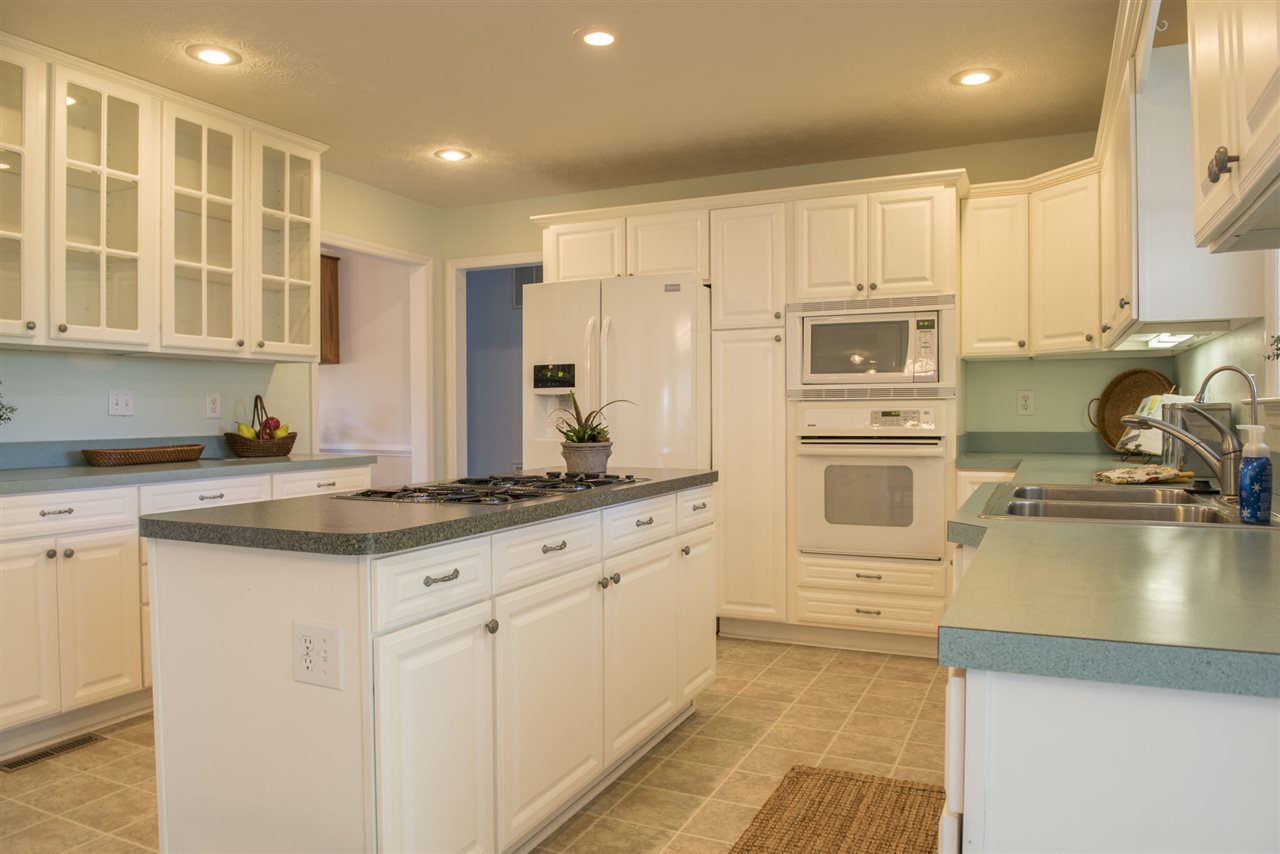 95 Lea Port Road Mount Sidney, VA 24467 - Photo 10 of 37 a kitchen with stainless steel appliances granite countertop a stove a sink and a refrigerator