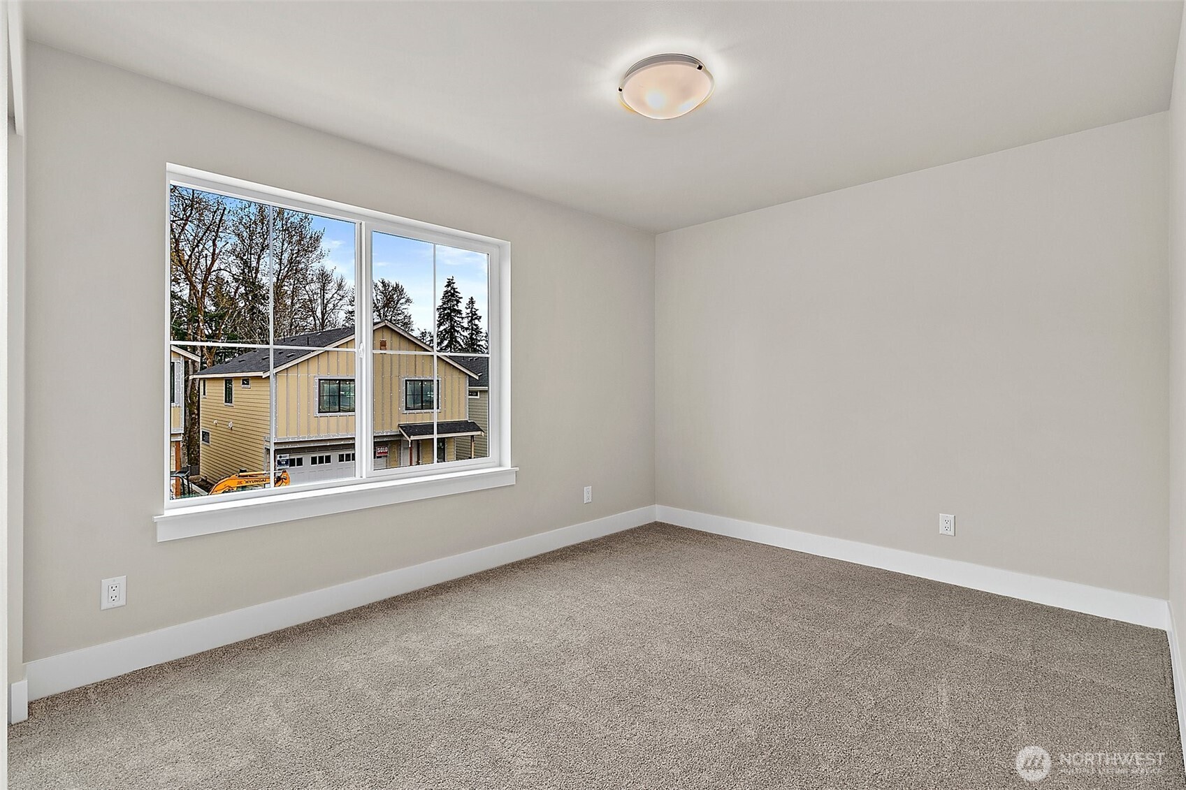 18510 Meridian Avenue Southeast, Unit CR 02 Bothell, WA 98012 - Photo 21 of 31 an empty room with a window