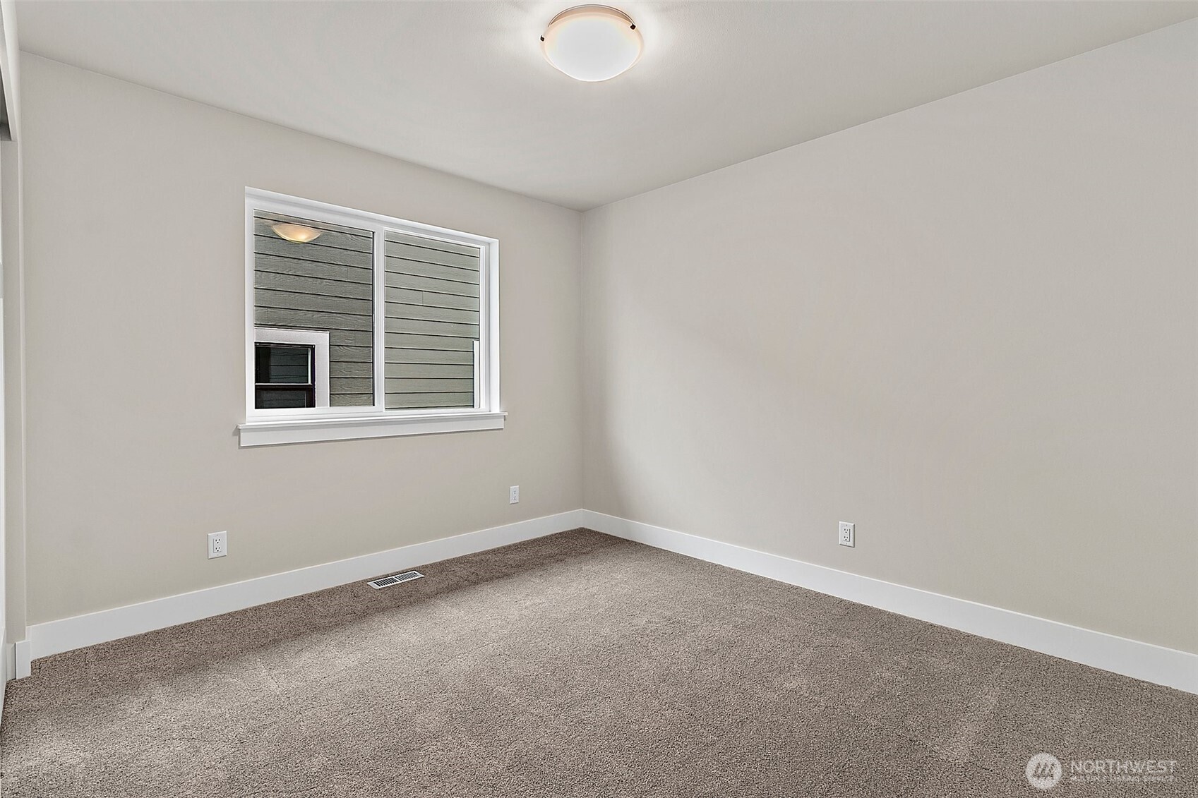 18510 Meridian Avenue Southeast, Unit CR 02 Bothell, WA 98012 - Photo 24 of 31 an empty room with a window