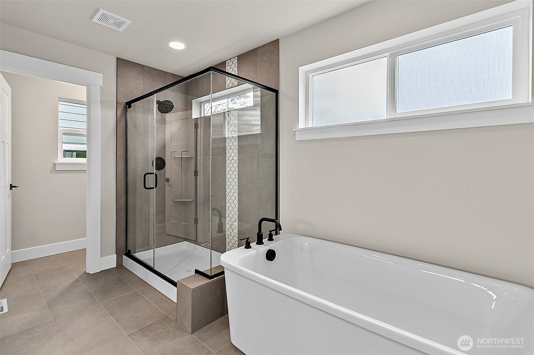 18510 Meridian Avenue Southeast, Unit CR 02 Bothell, WA 98012 - Photo 30 of 31 a bathroom with a tub and a shower