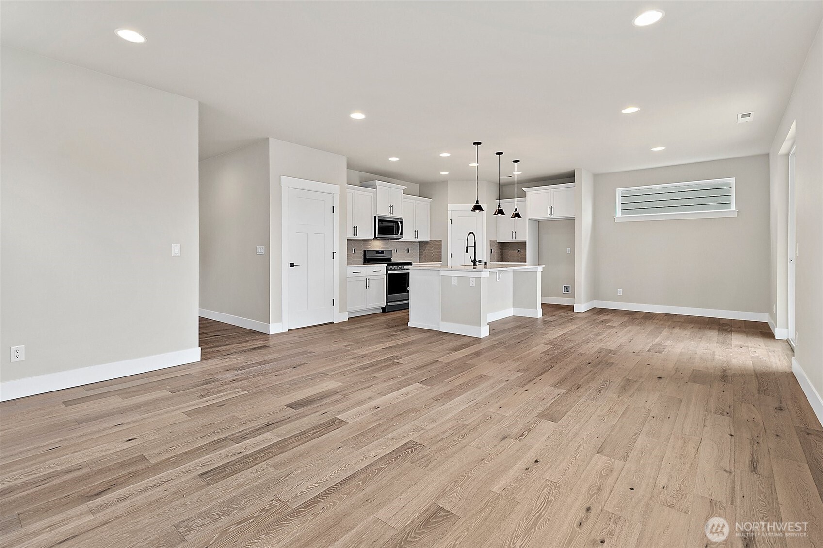 18510 Meridian Avenue Southeast, Unit CR 02 Bothell, WA 98012 - Photo 5 of 31 a view of kitchen with wooden floor