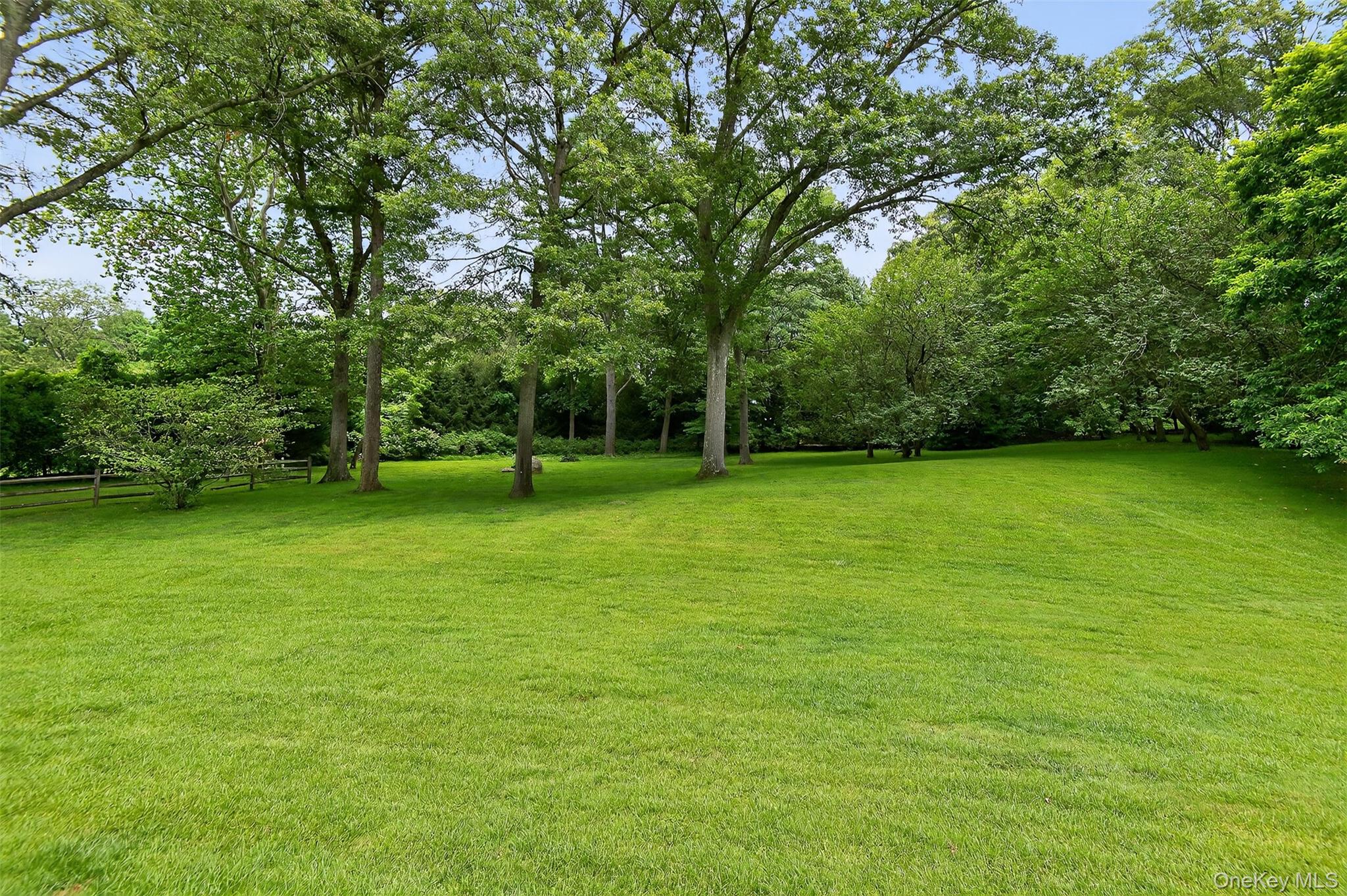 343 Chicken Valley Road Glen Head, NY 11545 - Photo 31 of 49 a view of a green field with trees