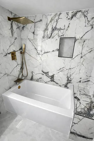 a bathroom with a bathtub