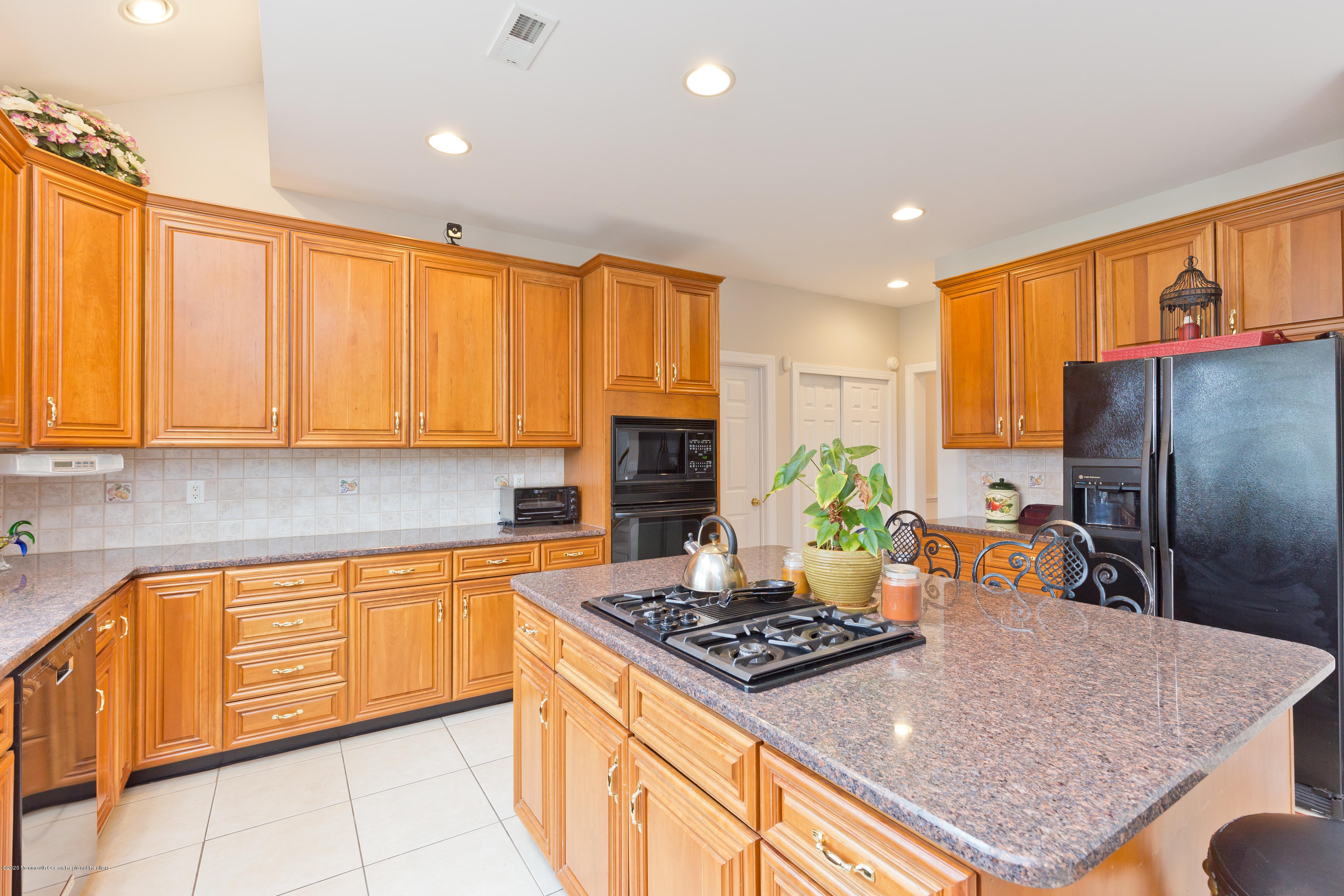 158 Otto Road Neshanic Station, NJ 08853 - Photo 27 of 50 a kitchen with stainless steel appliances granite countertop a stove top oven a sink dishwasher and a refrigerator
