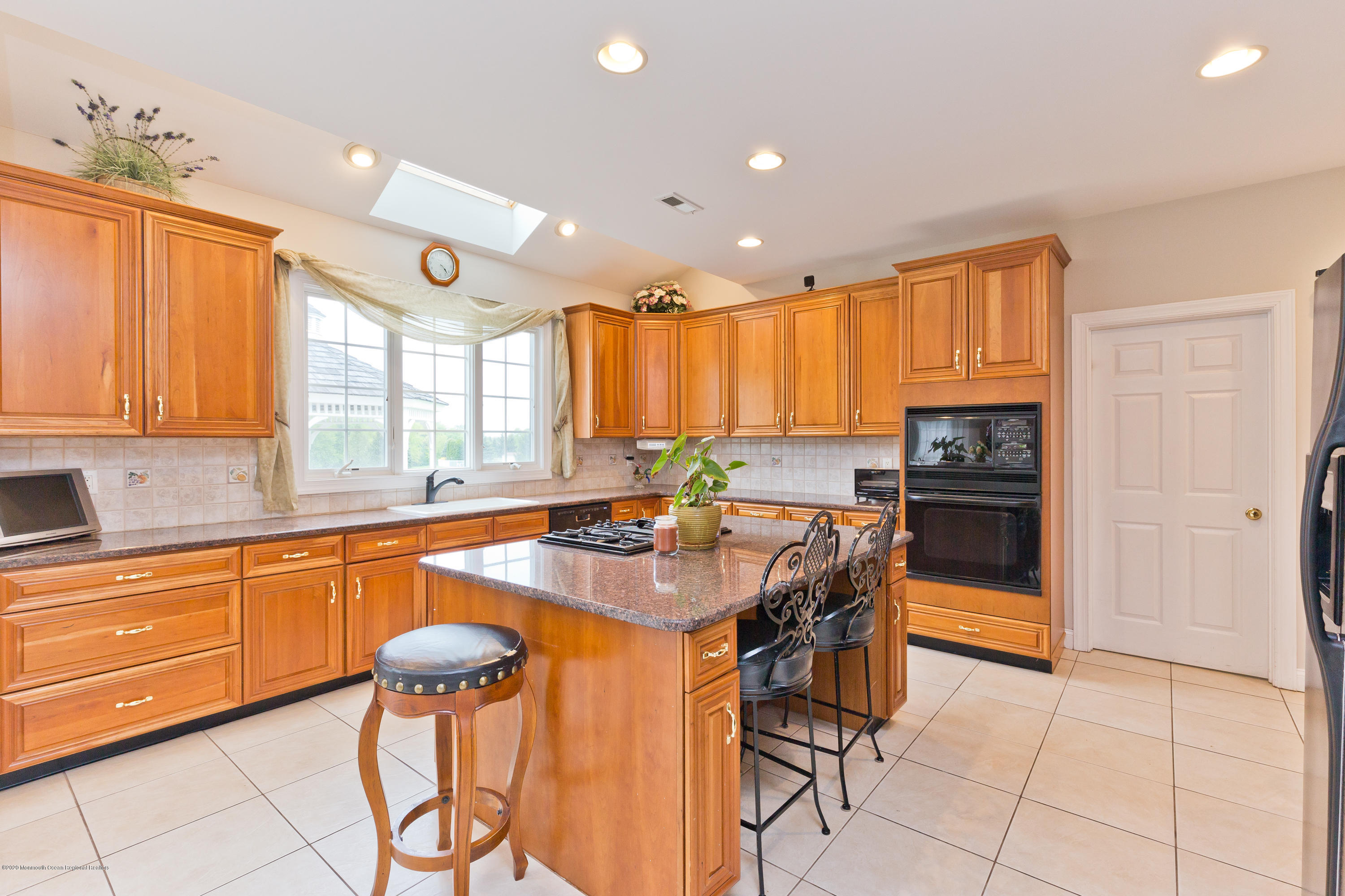 158 Otto Road Neshanic Station, NJ 08853 - Photo 28 of 50 a kitchen with stainless steel appliances granite countertop a stove a sink and a refrigerator