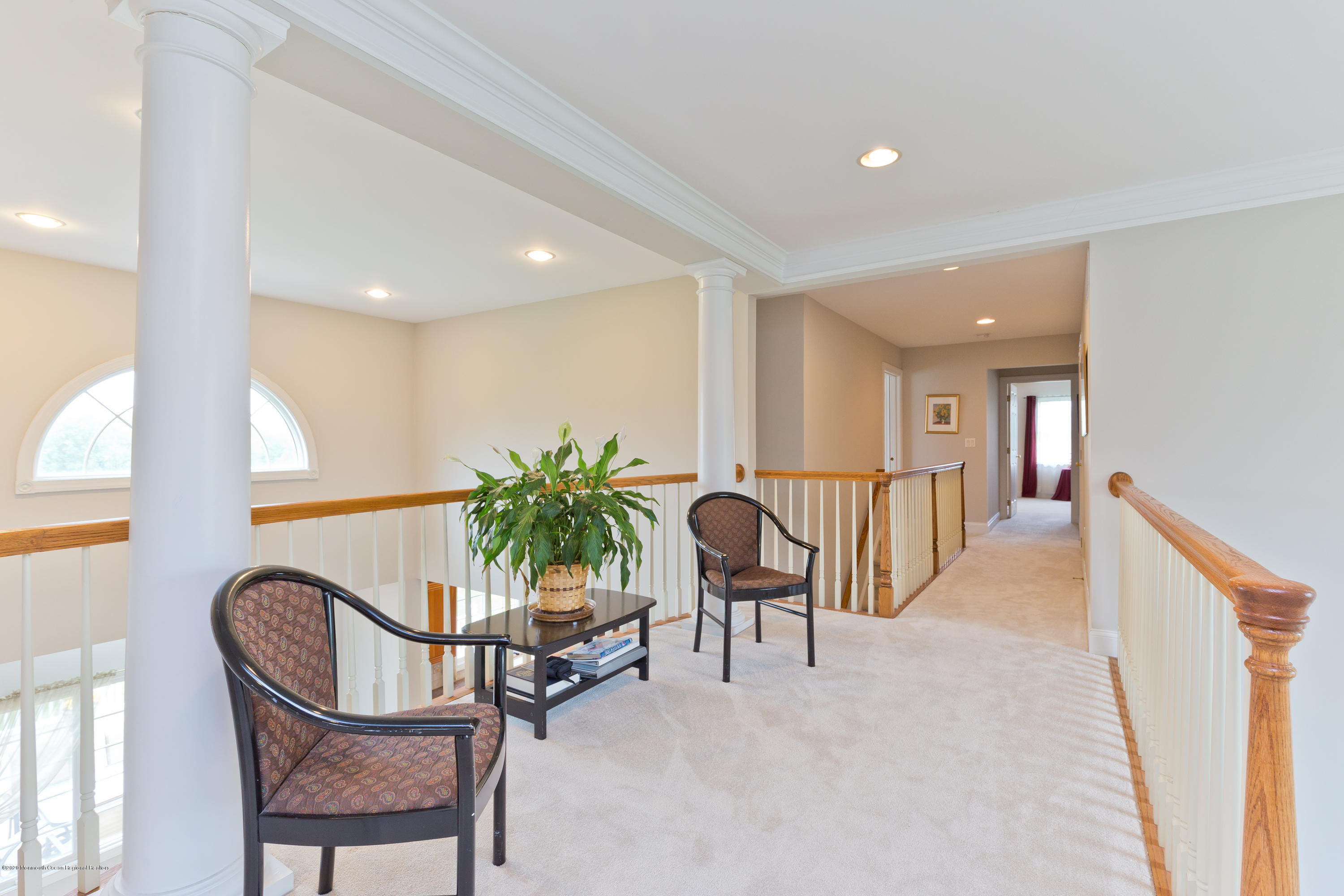 158 Otto Road Neshanic Station, NJ 08853 - Photo 40 of 50 a view of a hallway with furniture and a potted plant