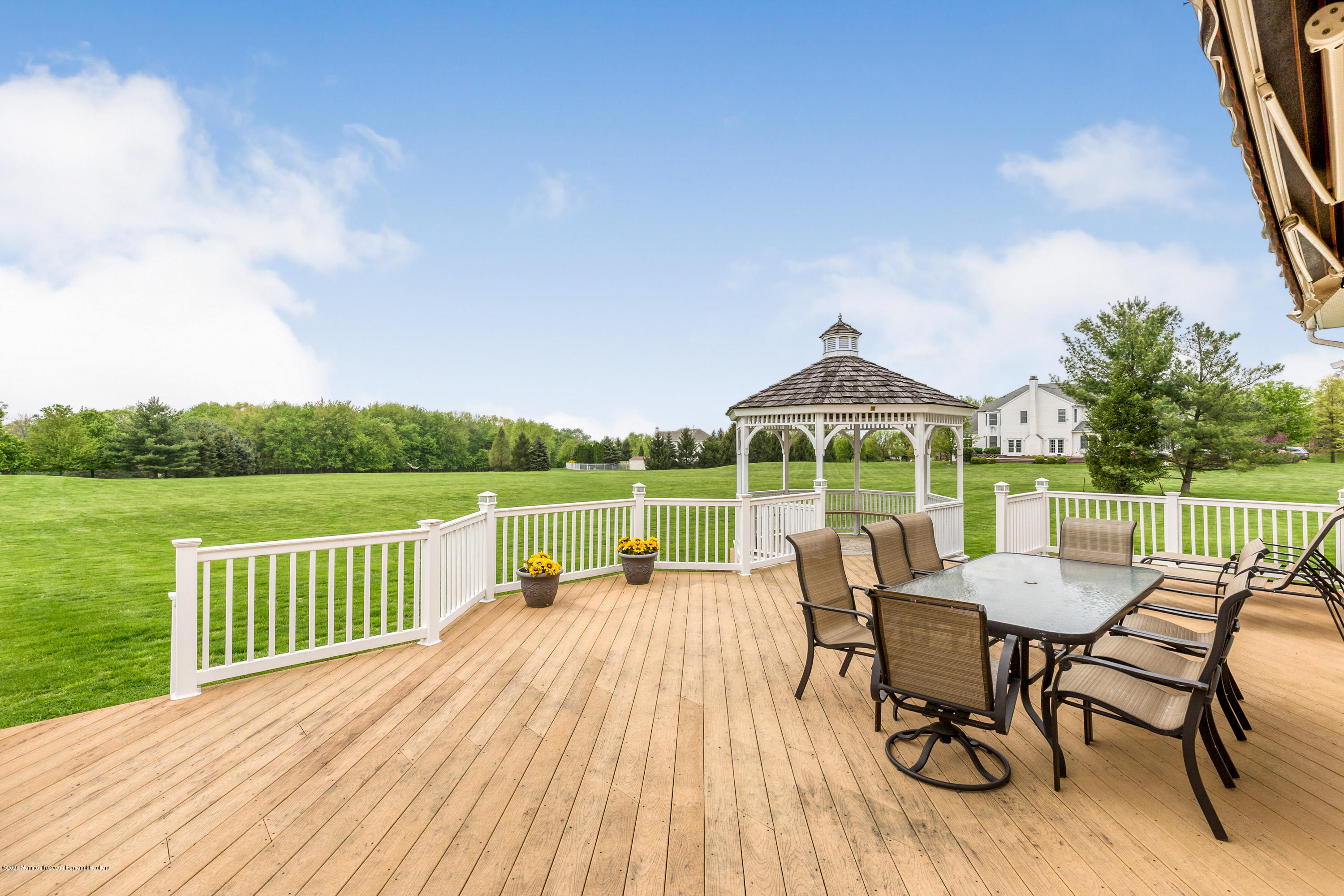 158 Otto Road Neshanic Station, NJ 08853 - Photo 5 of 50 a view of a chair and table on the terrace