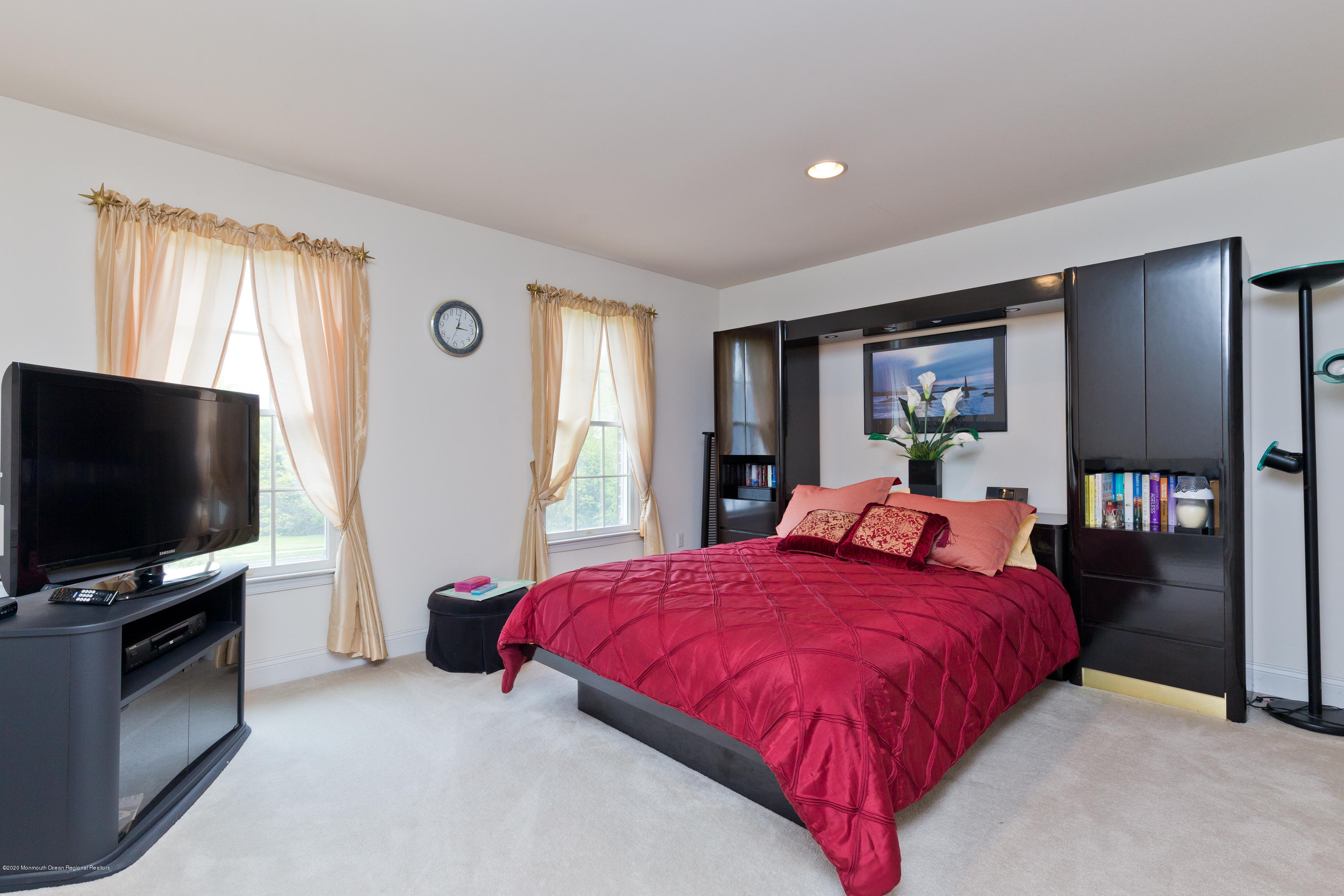 158 Otto Road Neshanic Station, NJ 08853 - Photo 43 of 50 a bedroom with a bed and a flat screen tv