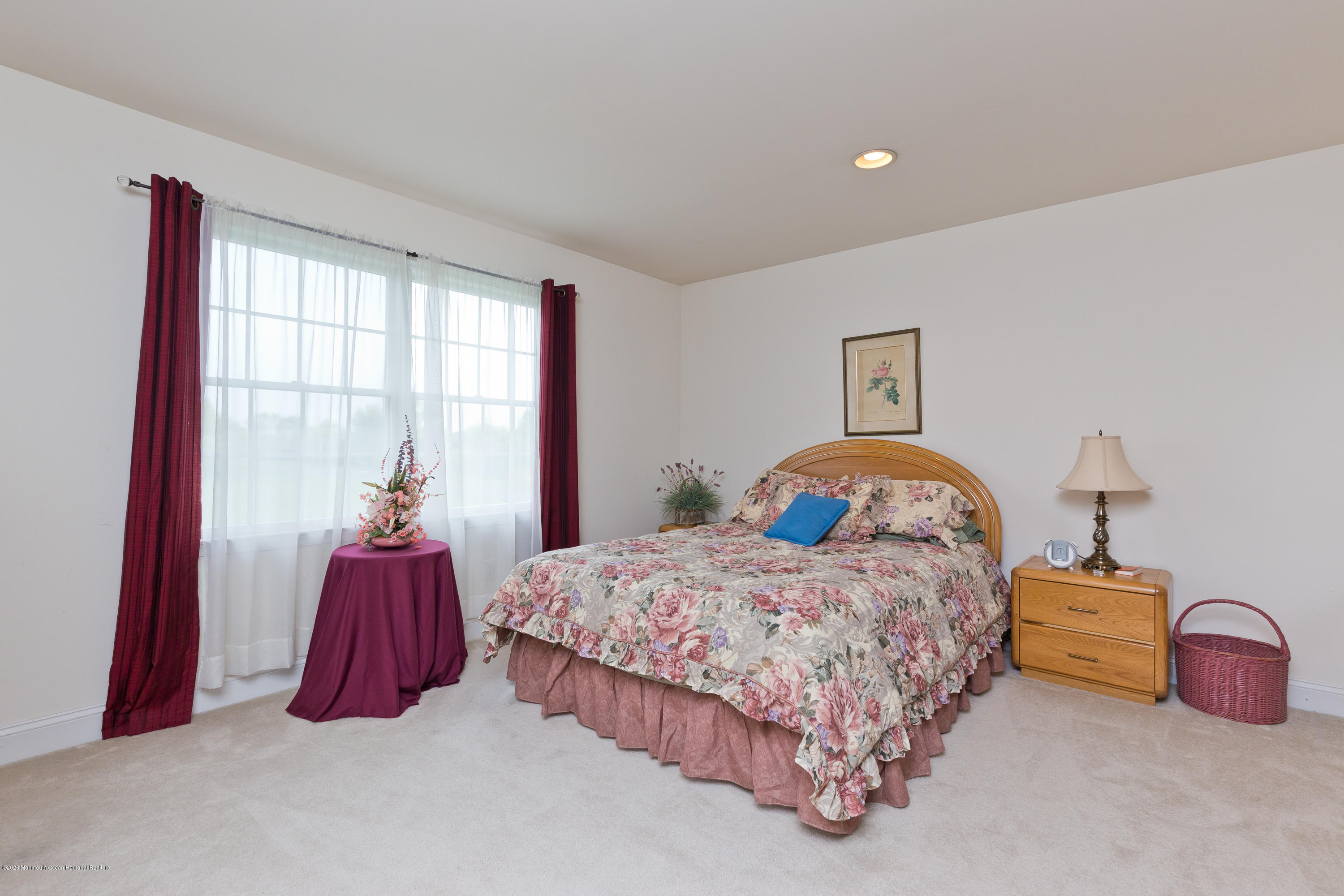 158 Otto Road Neshanic Station, NJ 08853 - Photo 45 of 50 a bedroom with a bed and a lamp