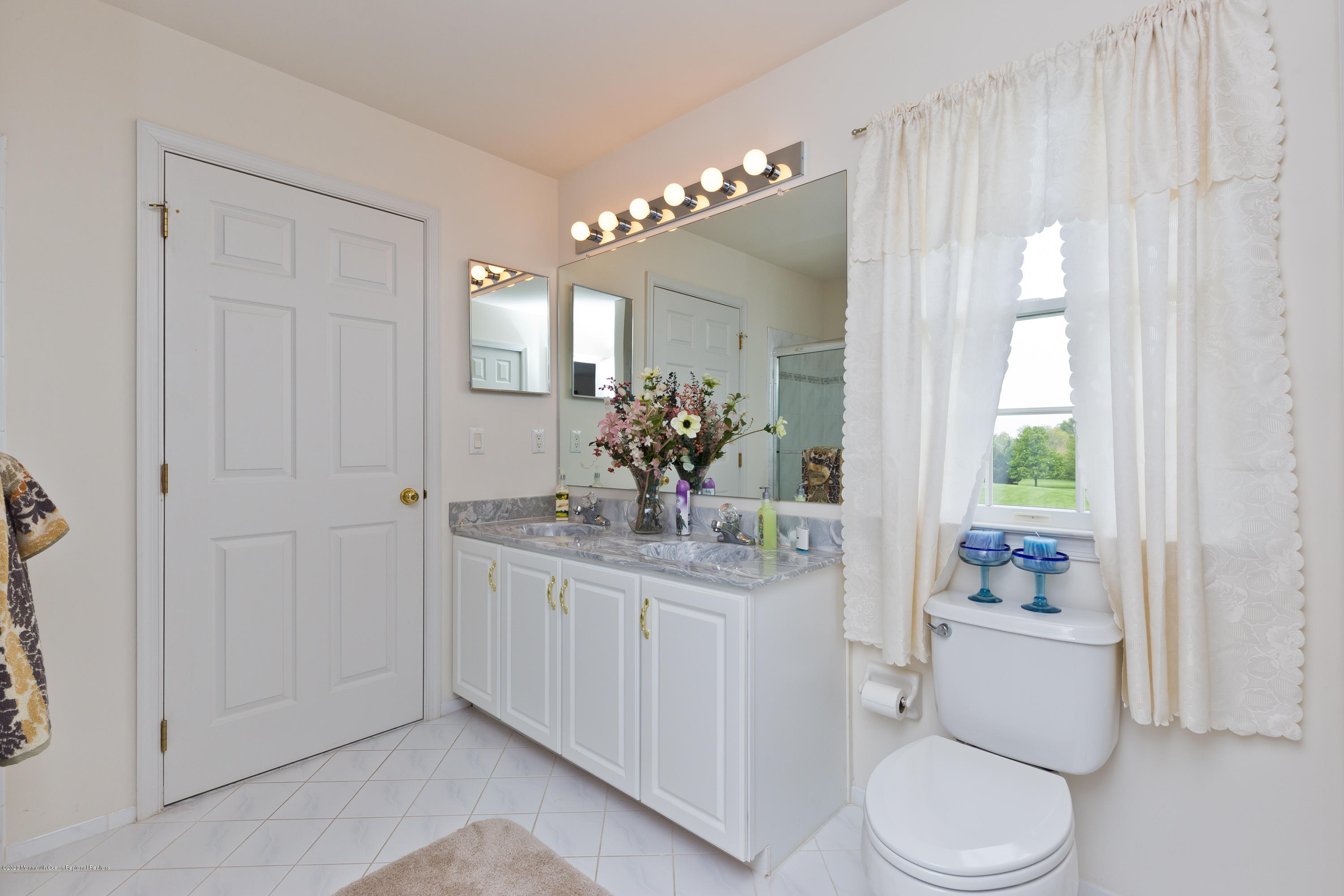 158 Otto Road Neshanic Station, NJ 08853 - Photo 46 of 50 a bathroom with a toilet sink and mirror