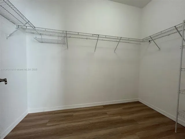 a view of a room with racks on the wall