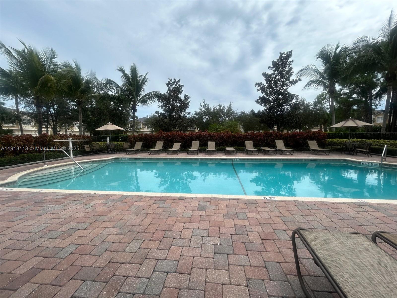 1560 Southeast Wilshire Place, Unit 103 Stuart, FL 34994 - Photo 29 of 33 a view of a lake