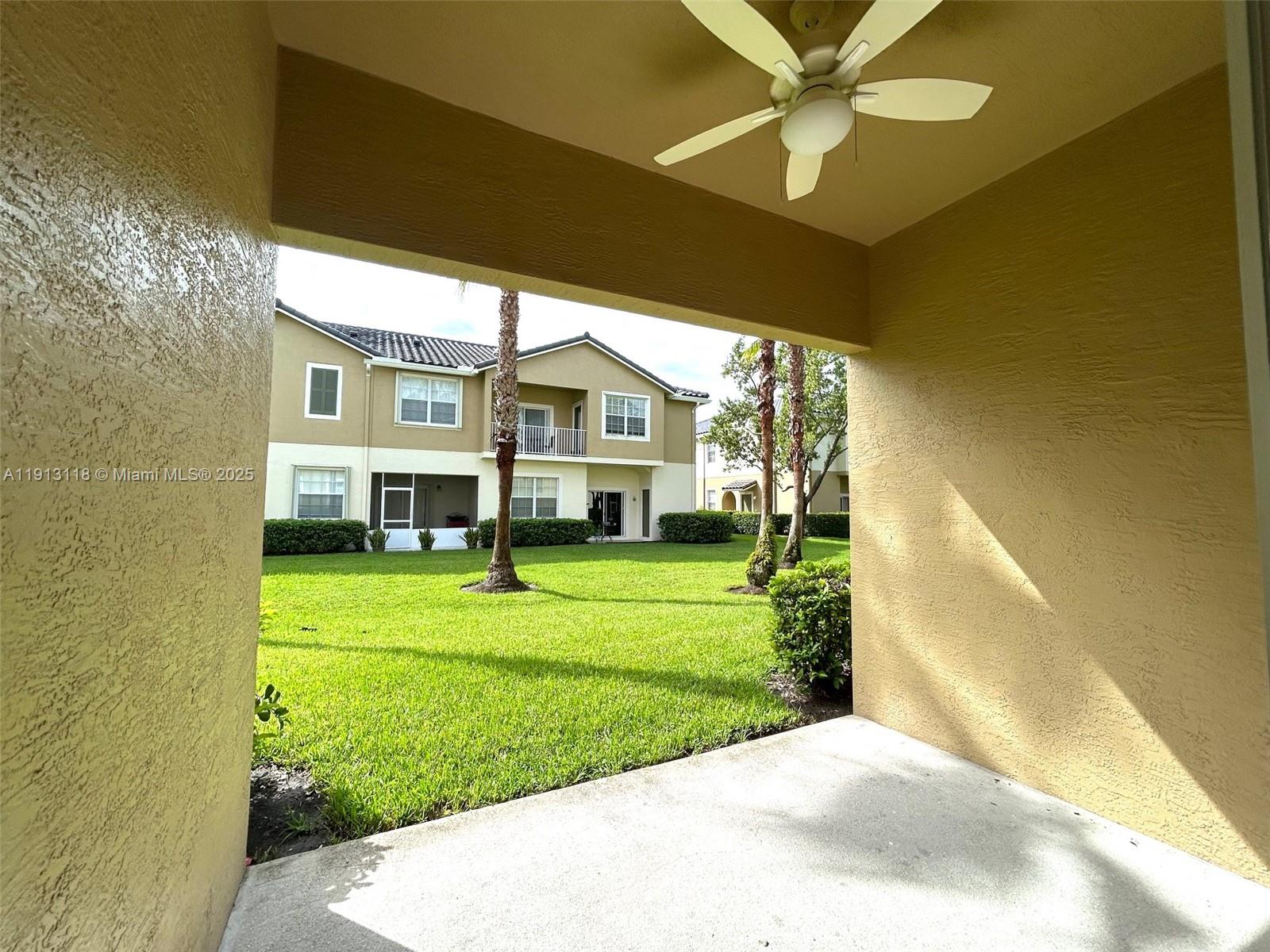 1560 Southeast Wilshire Place, Unit 103 Stuart, FL 34994 - Photo 3 of 33 a house view with a swimming pool