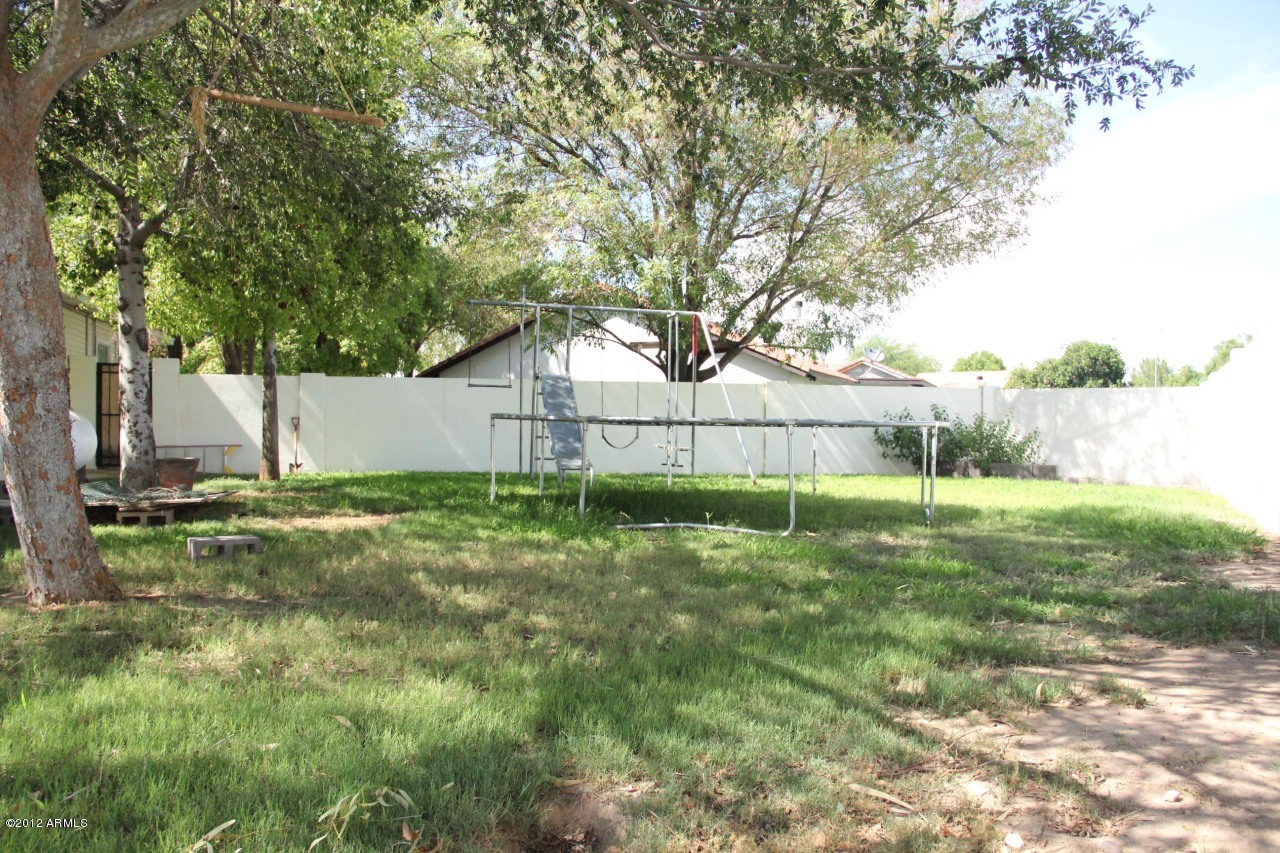 2210 North Gentry Mesa, AZ 85213 - Photo 9 of 11 a view of backyard with tree