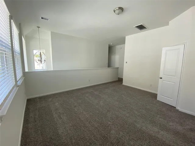 a front view of a house with yard