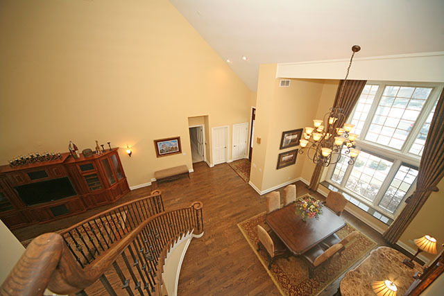 26W400 Churchill Road Winfield, IL 60190 - Photo 7 of 24 a living room with furniture and a chandelier