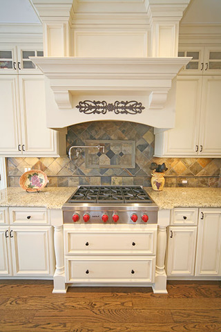 26W400 Churchill Road Winfield, IL 60190 - Photo 9 of 24 a stove top oven sitting inside of a kitchen