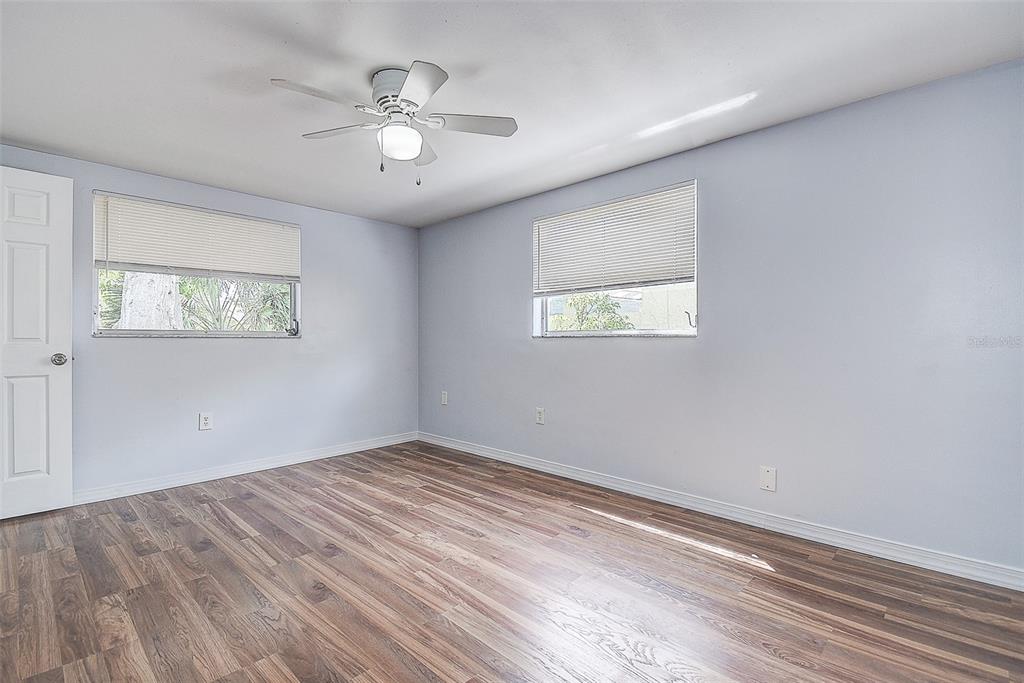 7830 Judith Crescent Port Richey, FL 34668 - Photo 17 of 35 Primary Bedroom with Ensuite