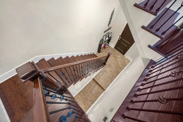 a view of stairs and hall