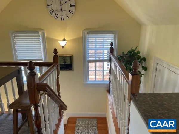 a view of an entryway with a workspace