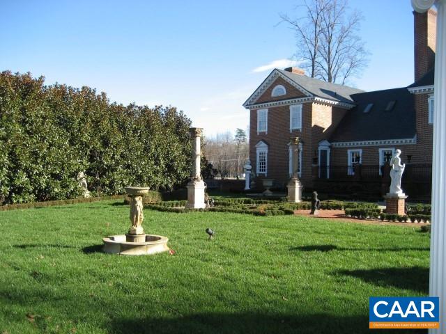 1920 Owensville Road, Unit B STUDIO Charlottesville, VA 22901 - Photo 5 of 26 a front view of a house with garden and trees