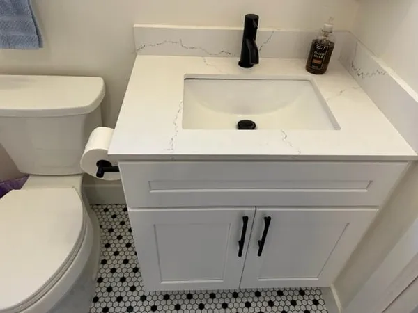a view of a balcony with wooden floor and outdoor space