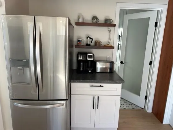 a bathroom with a sink and a shower