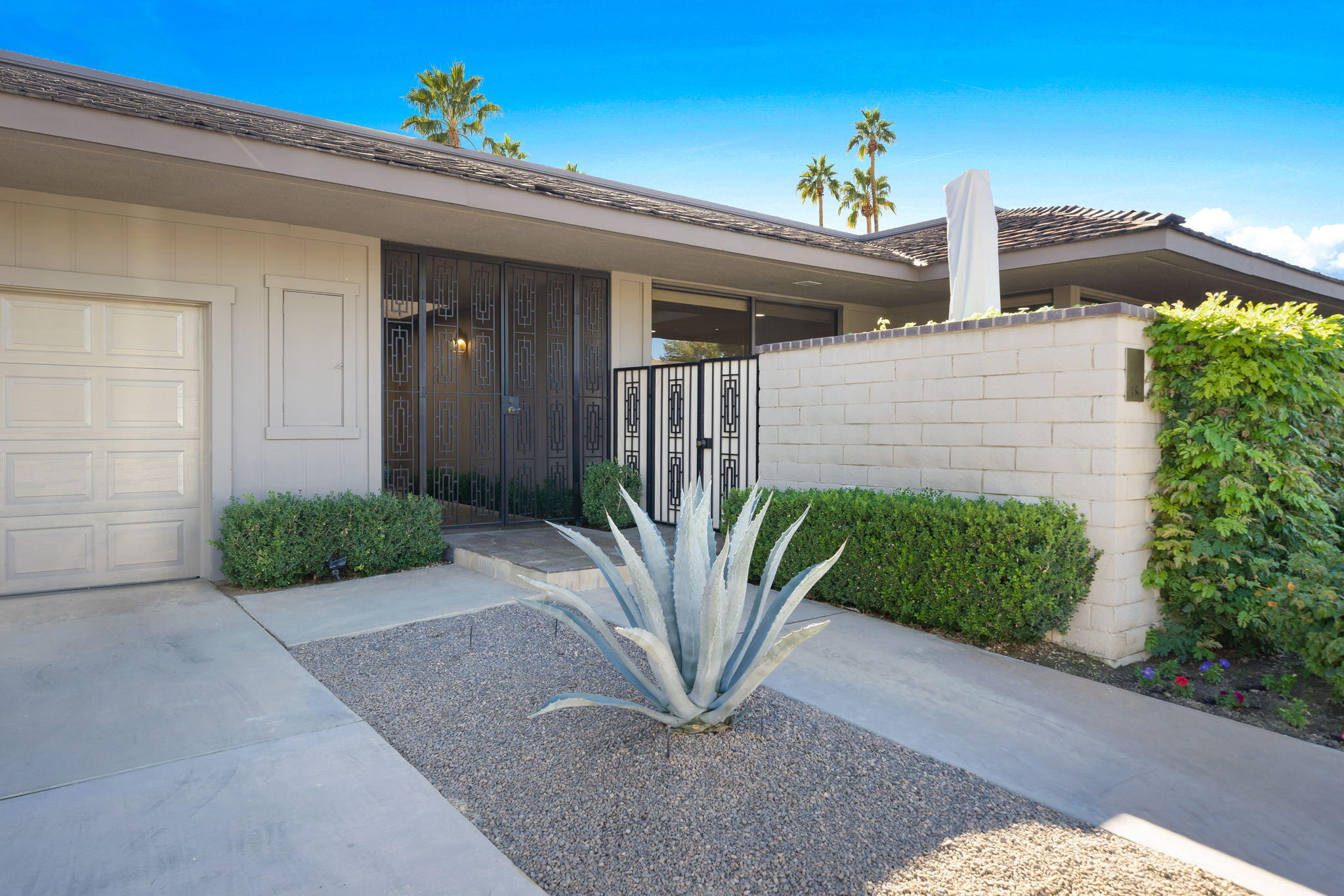 18 Lehigh Court Rancho Mirage, CA 92270 - Photo 2 of 53 a view of a entryway door of the house