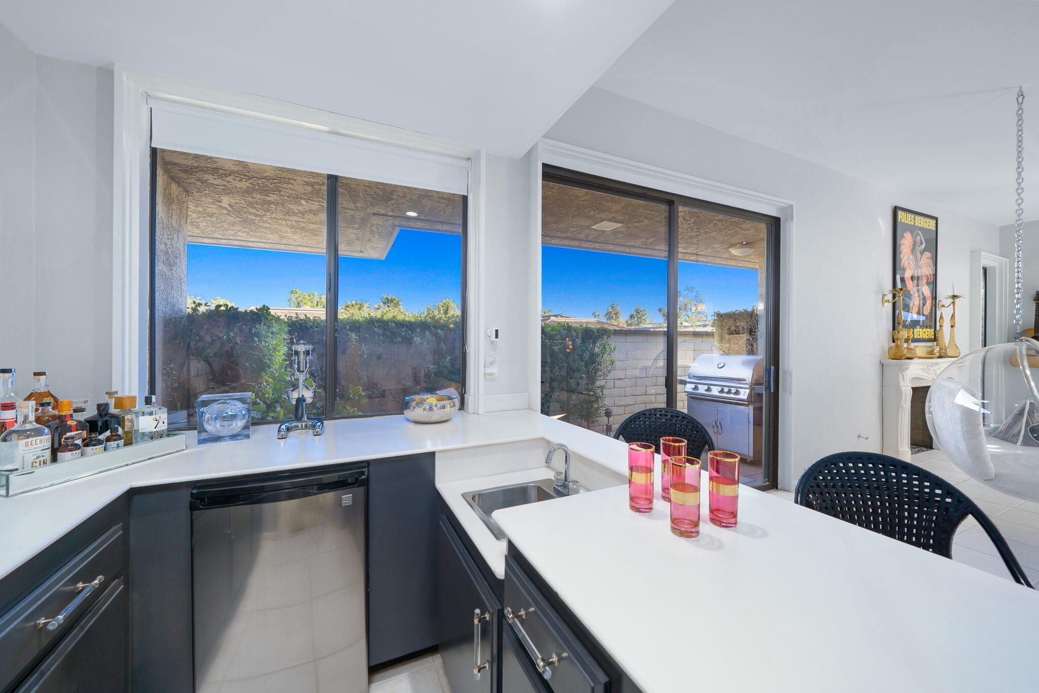 18 Lehigh Court Rancho Mirage, CA 92270 - Photo 12 of 53 a kitchen with a sink stove and a refrigerator
