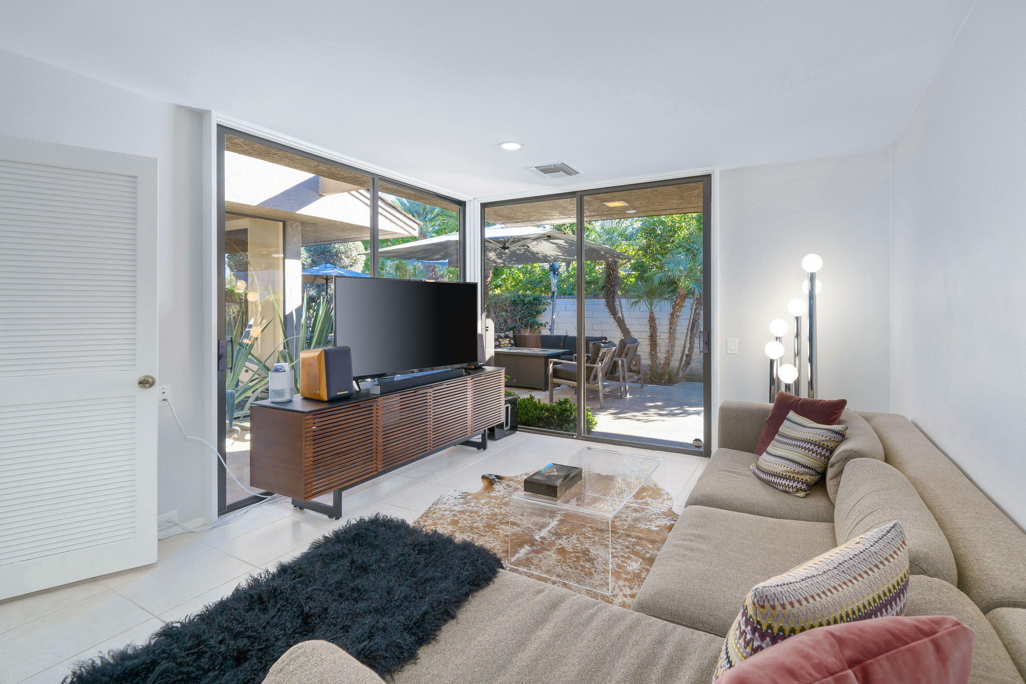 18 Lehigh Court Rancho Mirage, CA 92270 - Photo 17 of 53 a living room with furniture and a flat screen tv