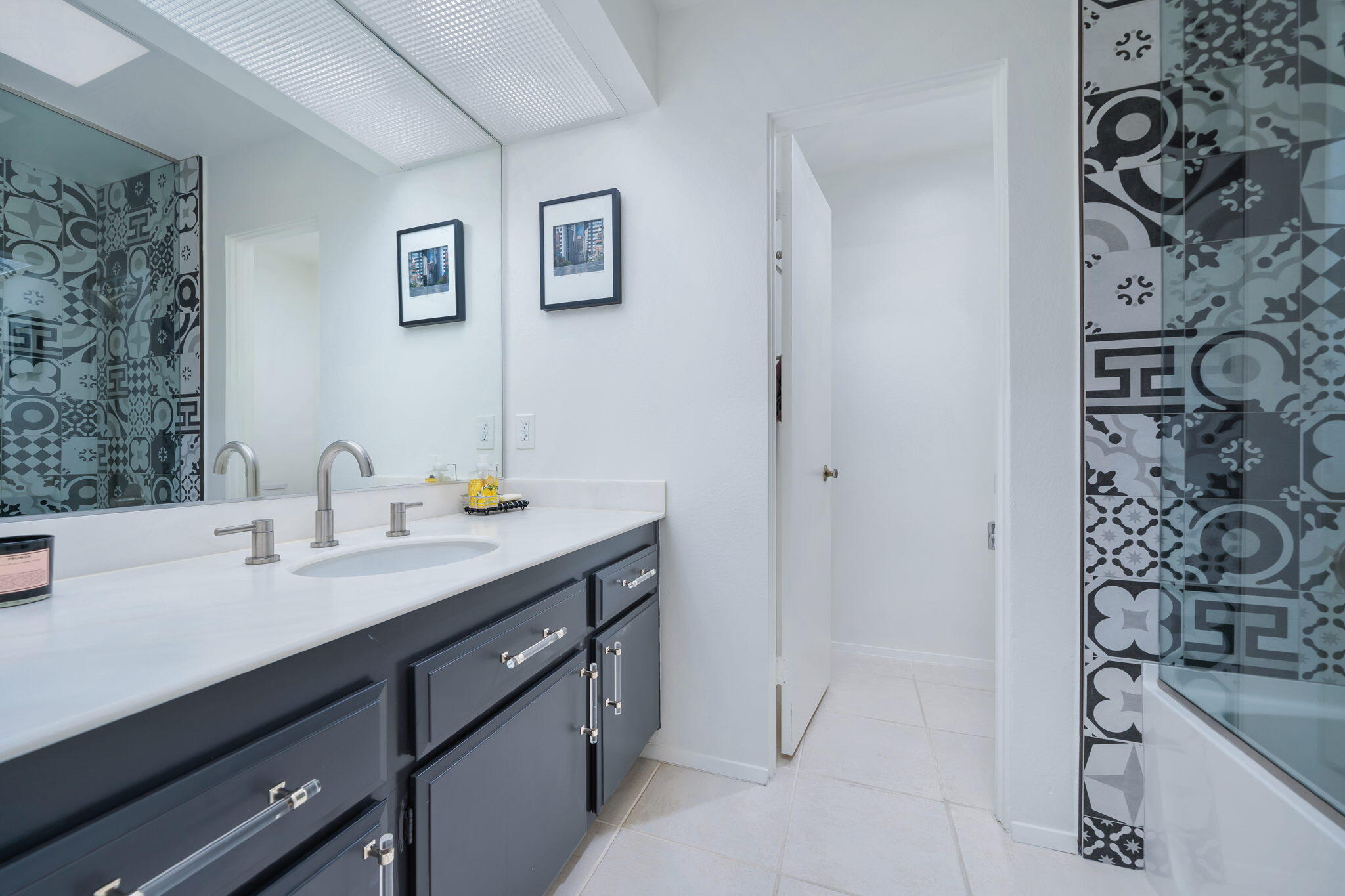 18 Lehigh Court Rancho Mirage, CA 92270 - Photo 32 of 53 a bathroom with a sink and a mirror