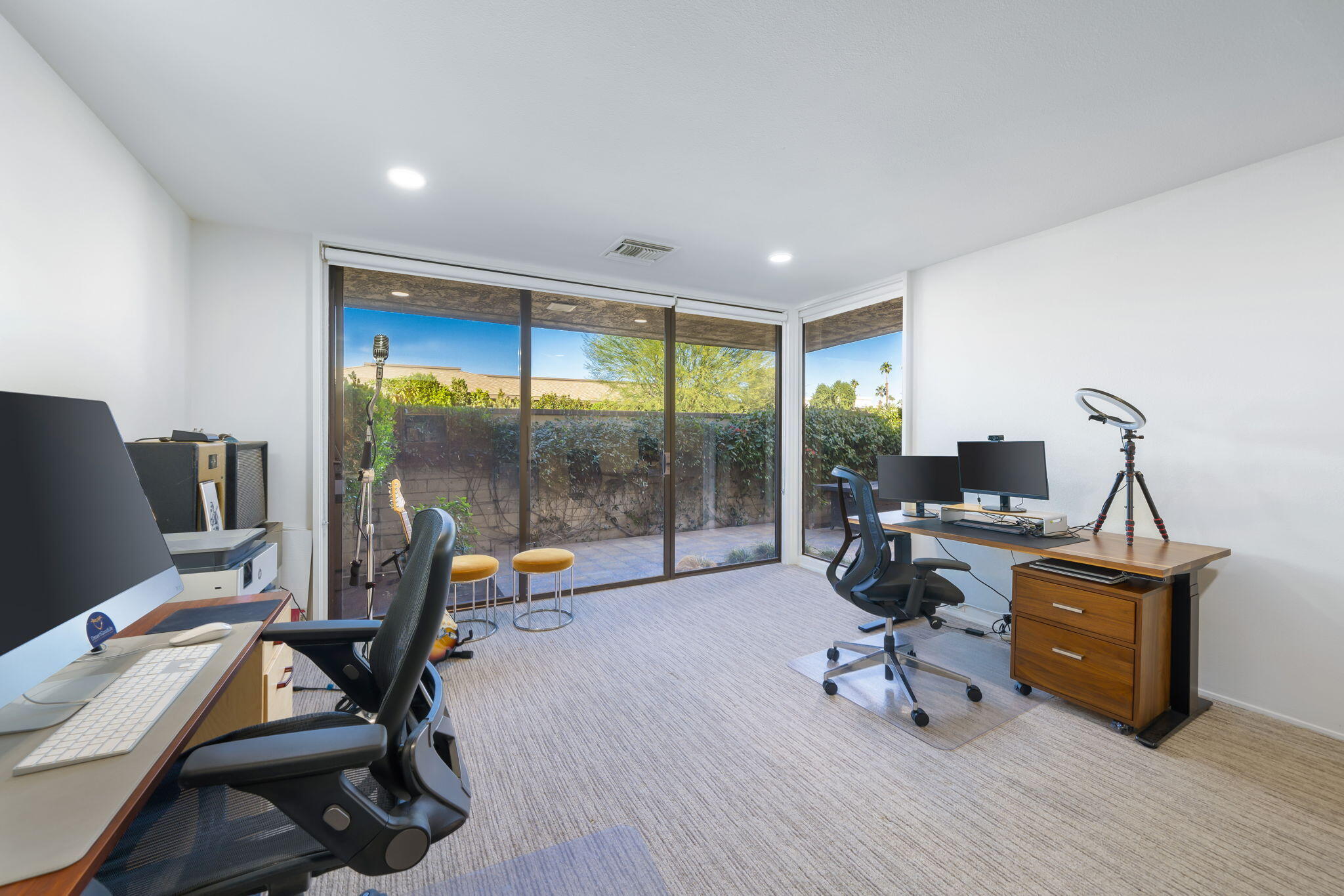 18 Lehigh Court Rancho Mirage, CA 92270 - Photo 35 of 53 a work room with furniture and a wooden floor