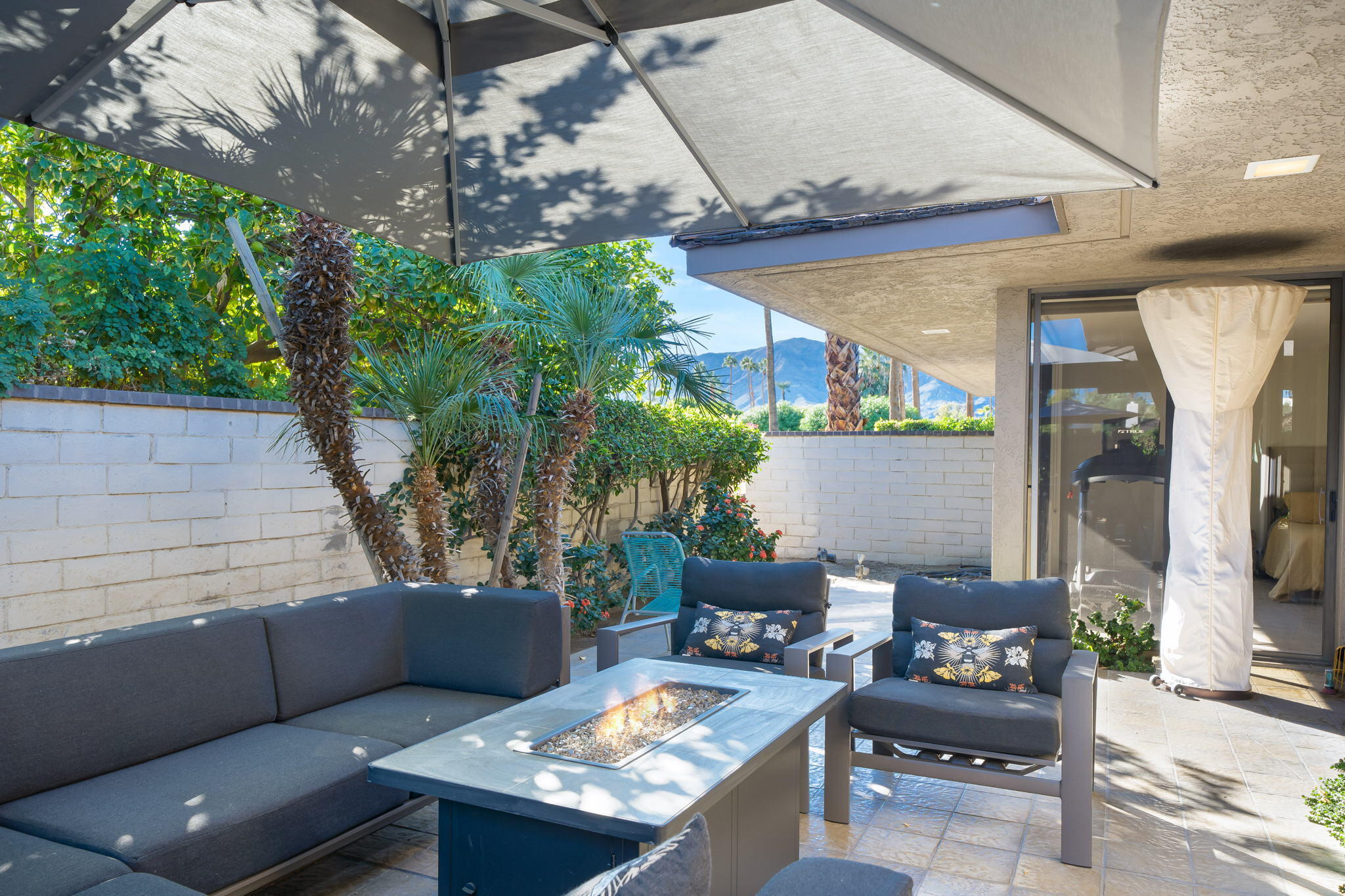 18 Lehigh Court Rancho Mirage, CA 92270 - Photo 45 of 53 a outdoor living space with furniture and a potted plant