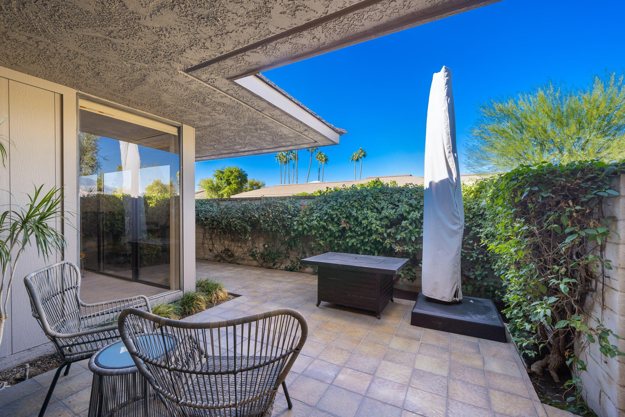 18 Lehigh Court Rancho Mirage, CA 92270 - Photo 50 of 53 a view of a house with backyard and sitting area