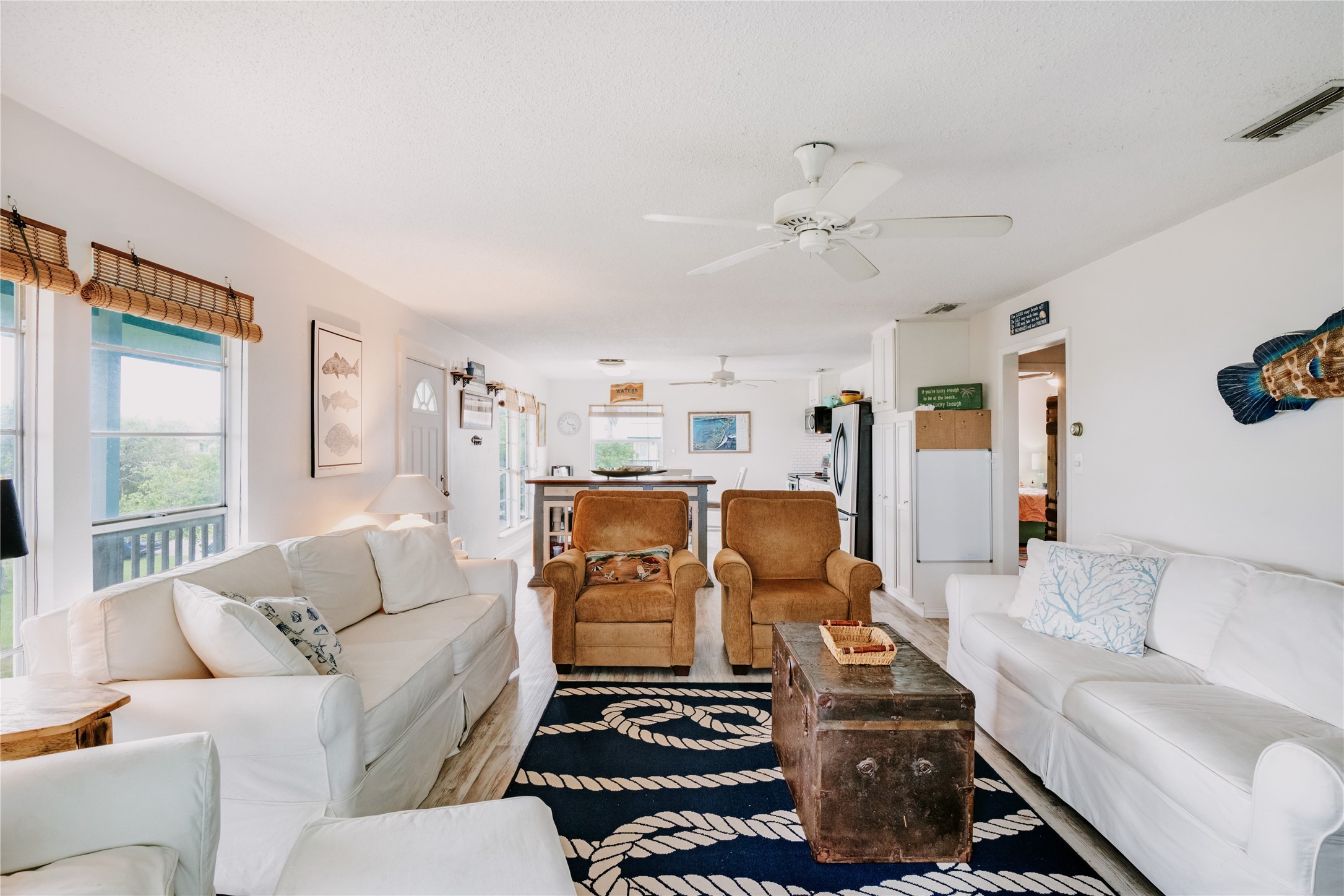 88 Bay Street Port O'Connor, TX 77982 - Photo 13 of 23 a living room with furniture kitchen view and a window