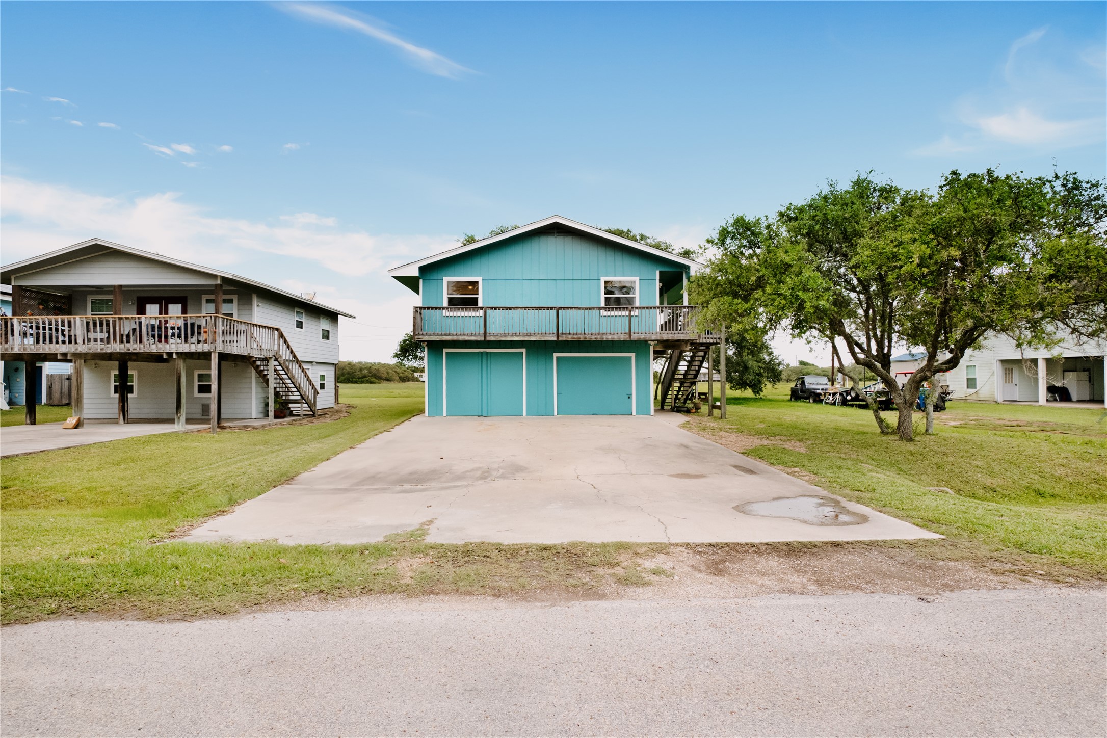 88 Bay Street Port O'Connor, TX 77982 - Photo 19 of 23 a house view with a garden space
