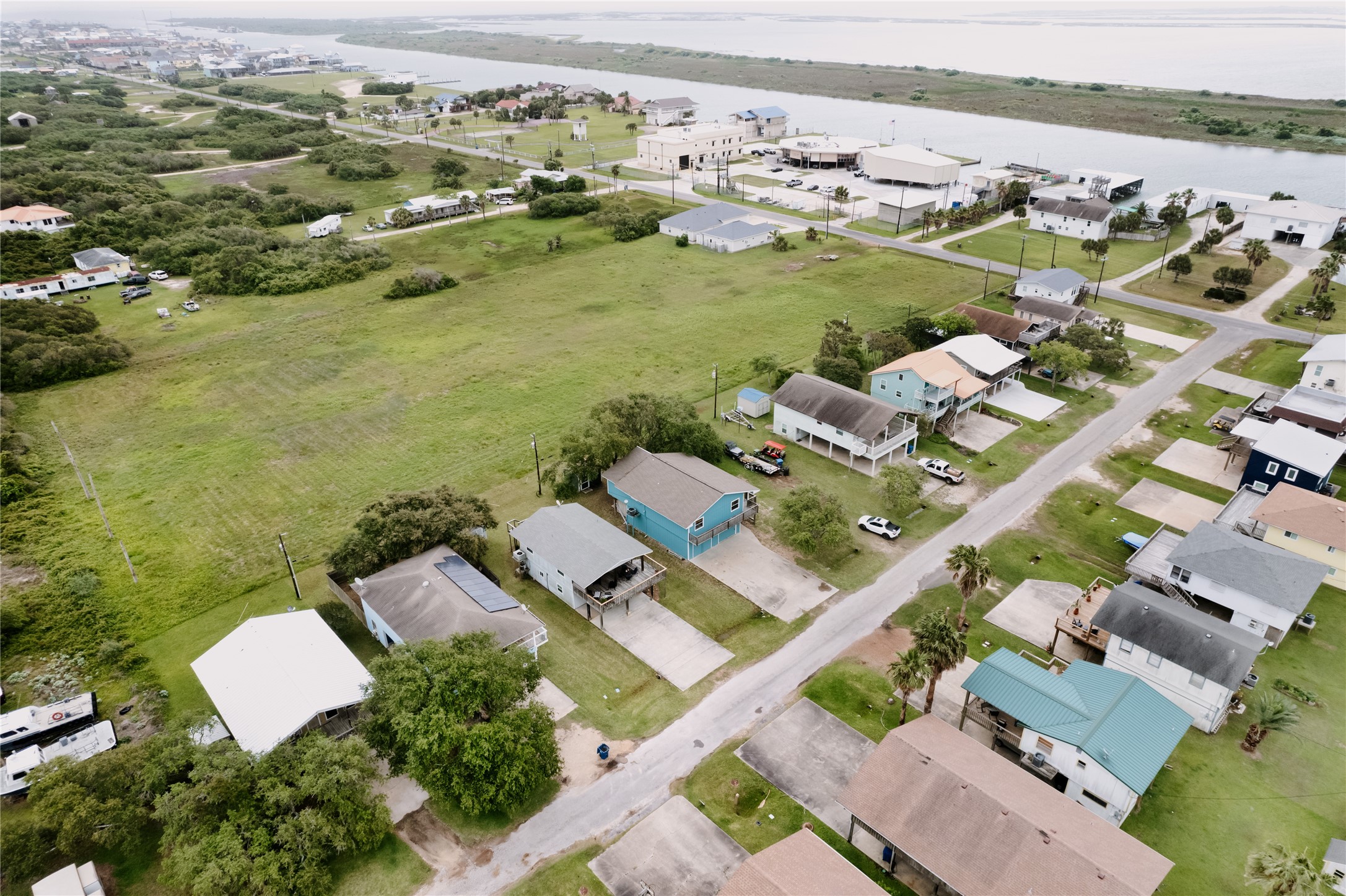 88 Bay Street Port O'Connor, TX 77982 - Photo 2 of 23 an aerial view of residential houses with outdoor space