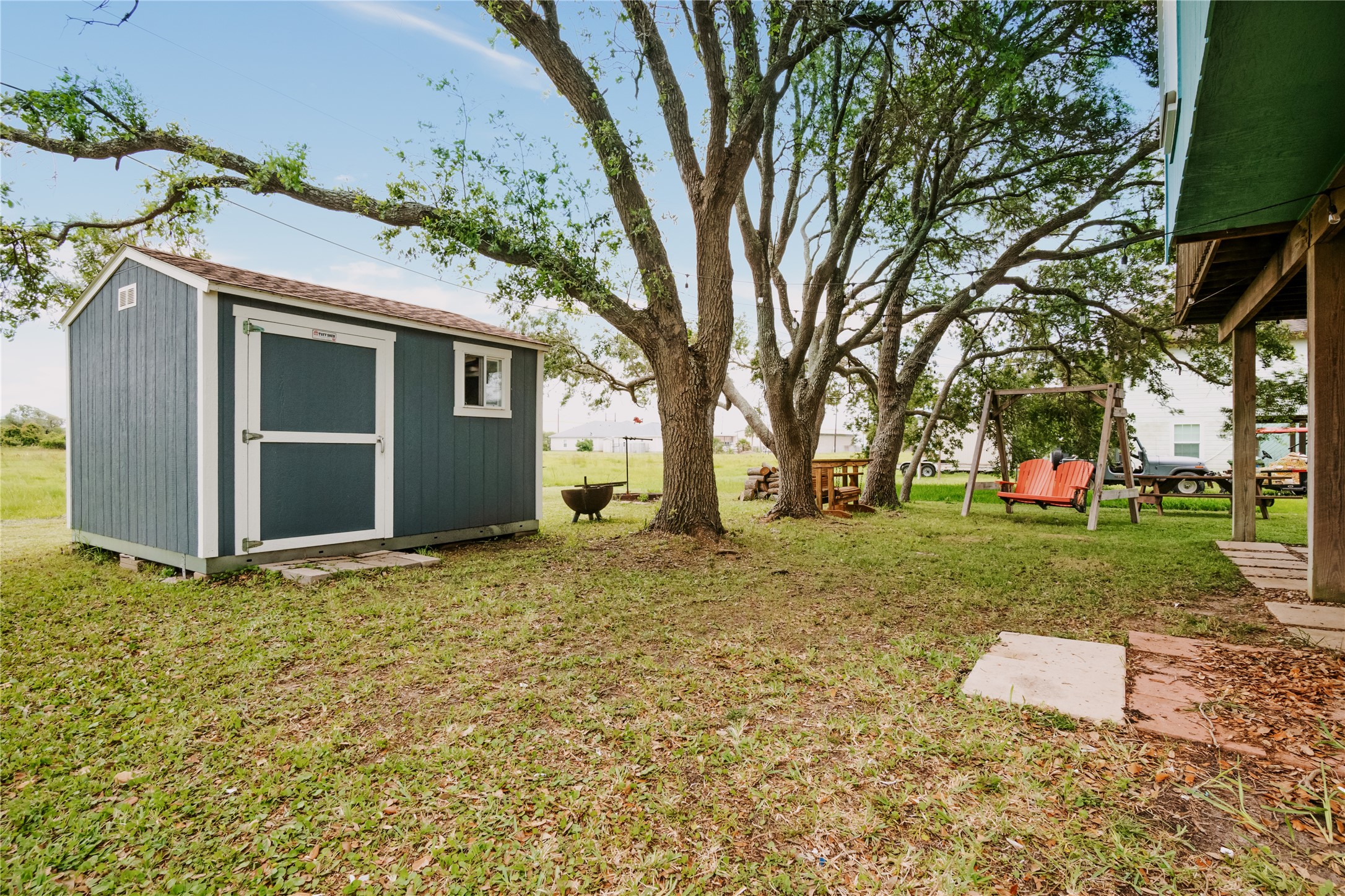 88 Bay Street Port O'Connor, TX 77982 - Photo 7 of 23 a view of a house with a yard