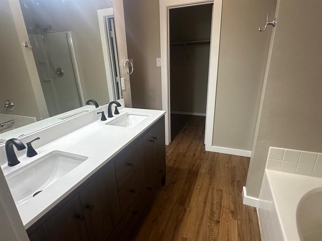 203 Shadow Bend Drive Red Oak, TX 75154 - Photo 14 of 15 a bathroom with a sink and a mirror