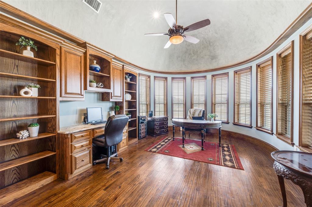 141 Waters Edge Way Oak Point, TX 75068 - Photo 7 of 25 a living room with furniture a rug and wooden floor