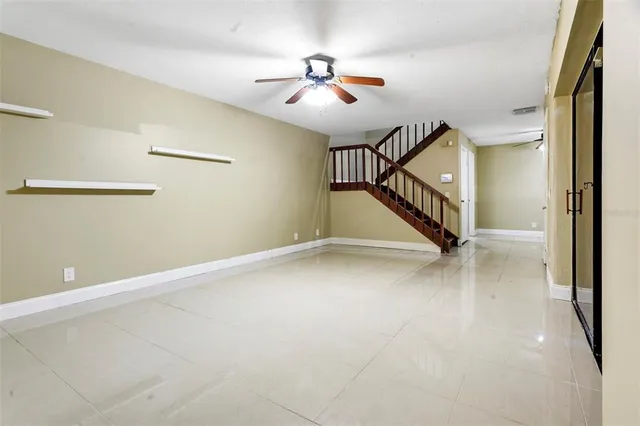 a view of a hallway with staircase