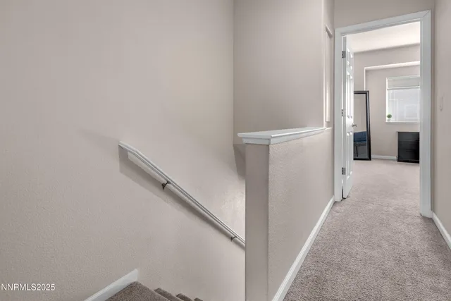 a view of a house with backyard and windows