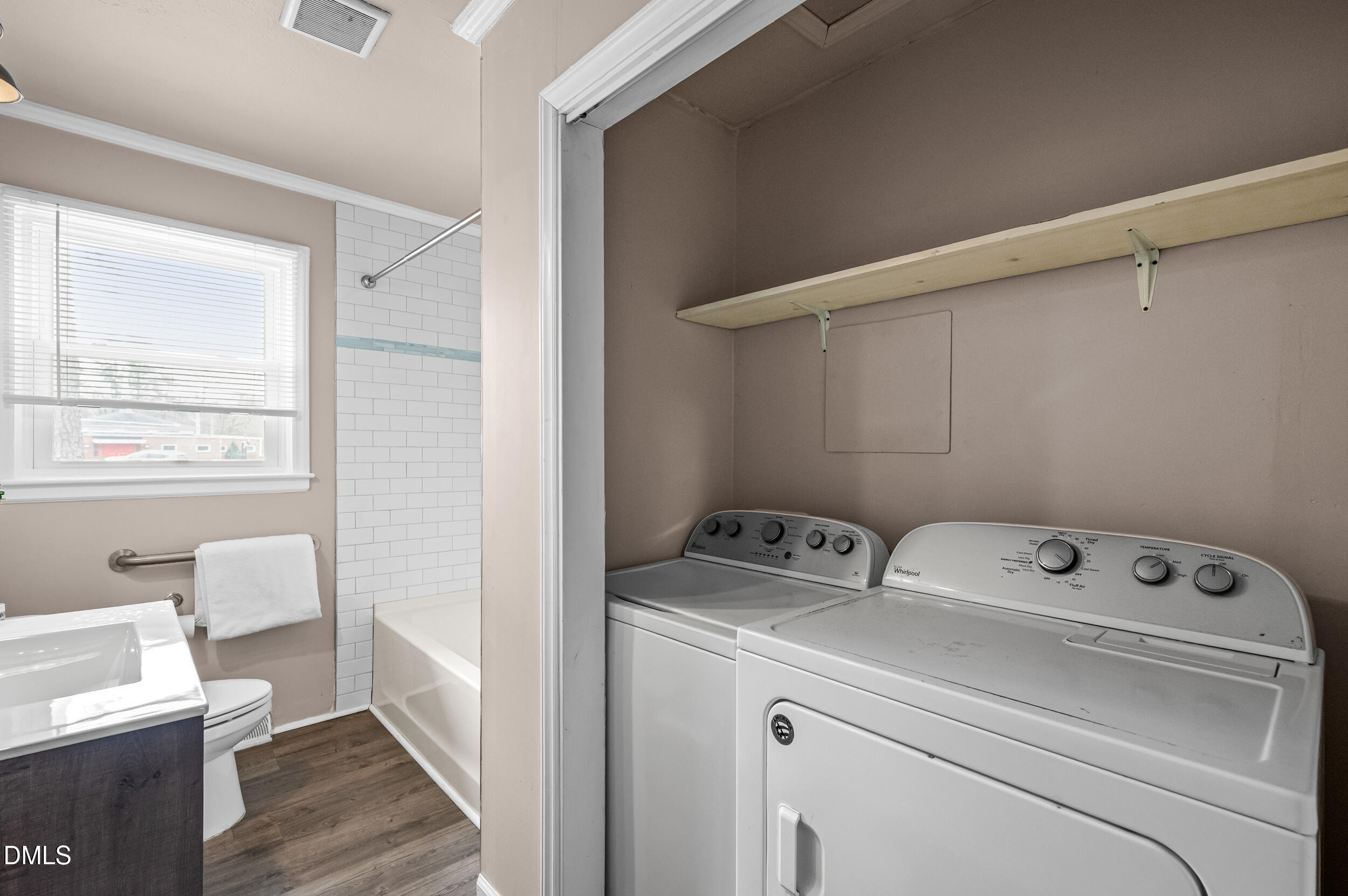 401 Moline Street Durham, NC 27707 - Photo 12 of 20 a utility room with dryer and washer