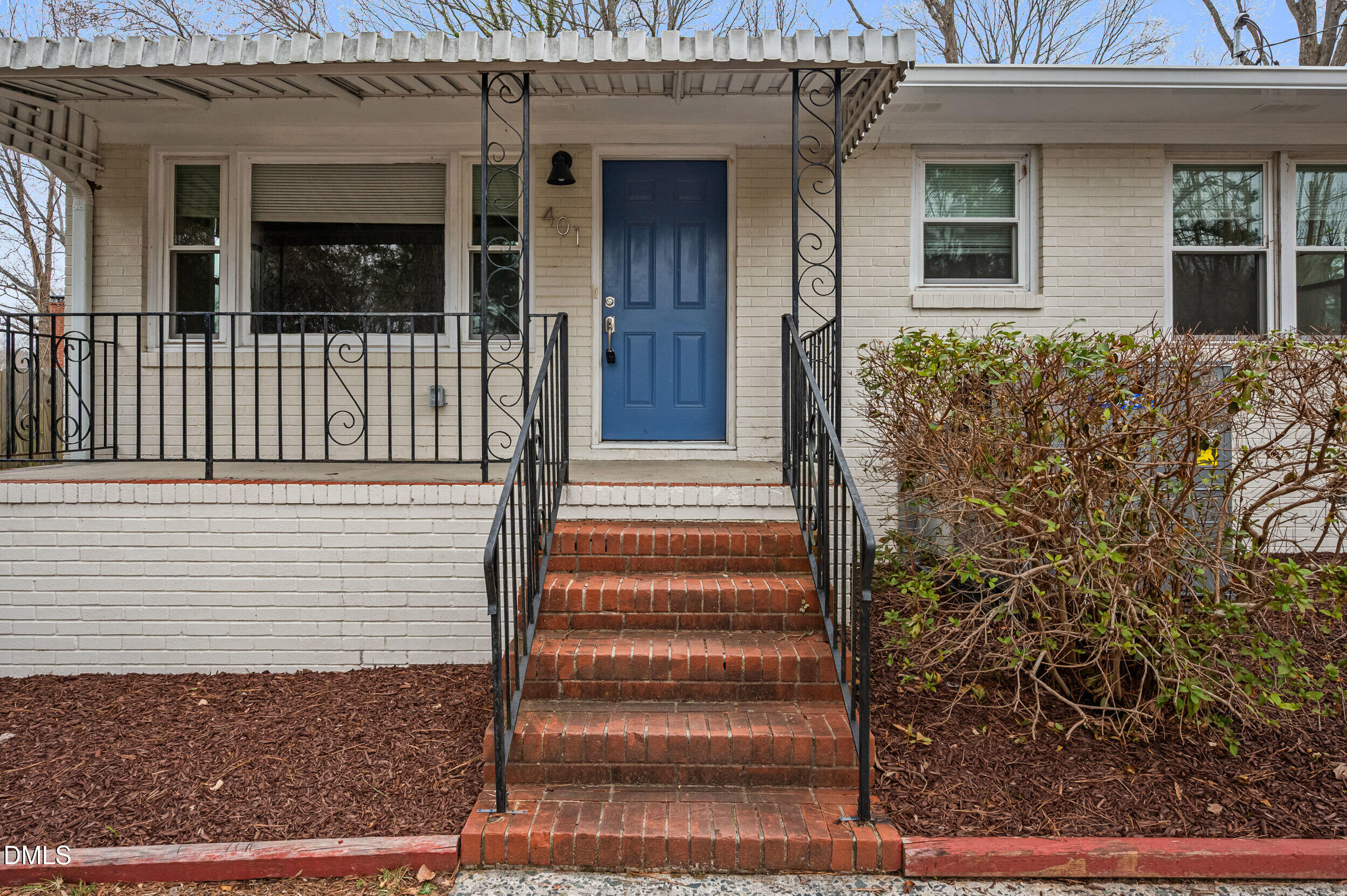 401 Moline Street Durham, NC 27707 - Photo 2 of 20 a view of house with wooden door and windows