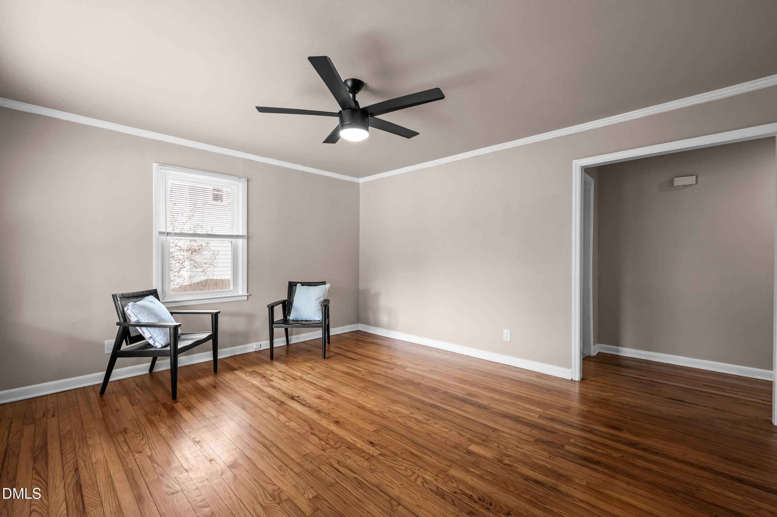 401 Moline Street Durham, NC 27707 - Photo 3 of 20 a view of a workspace with wooden floor and a window