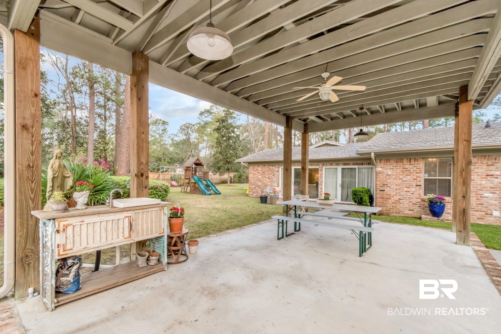 154 Fenwick Road Mobile, AL 36608 - Photo 35 of 48 View of patio / terrace with a playground and a ceiling fan