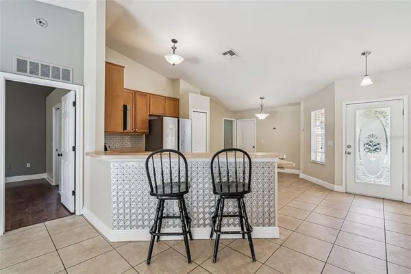 a view of hall way with furniture