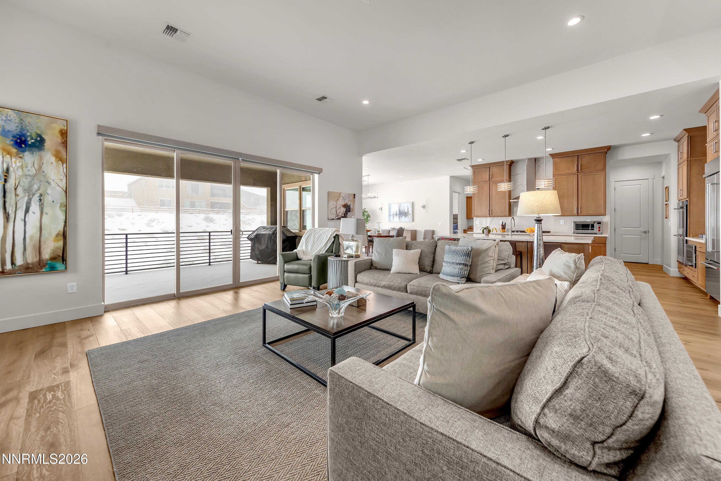 9109 Wild Skies Way Reno, NV 89523 - Photo 3 of 81 a living room with furniture and a large window