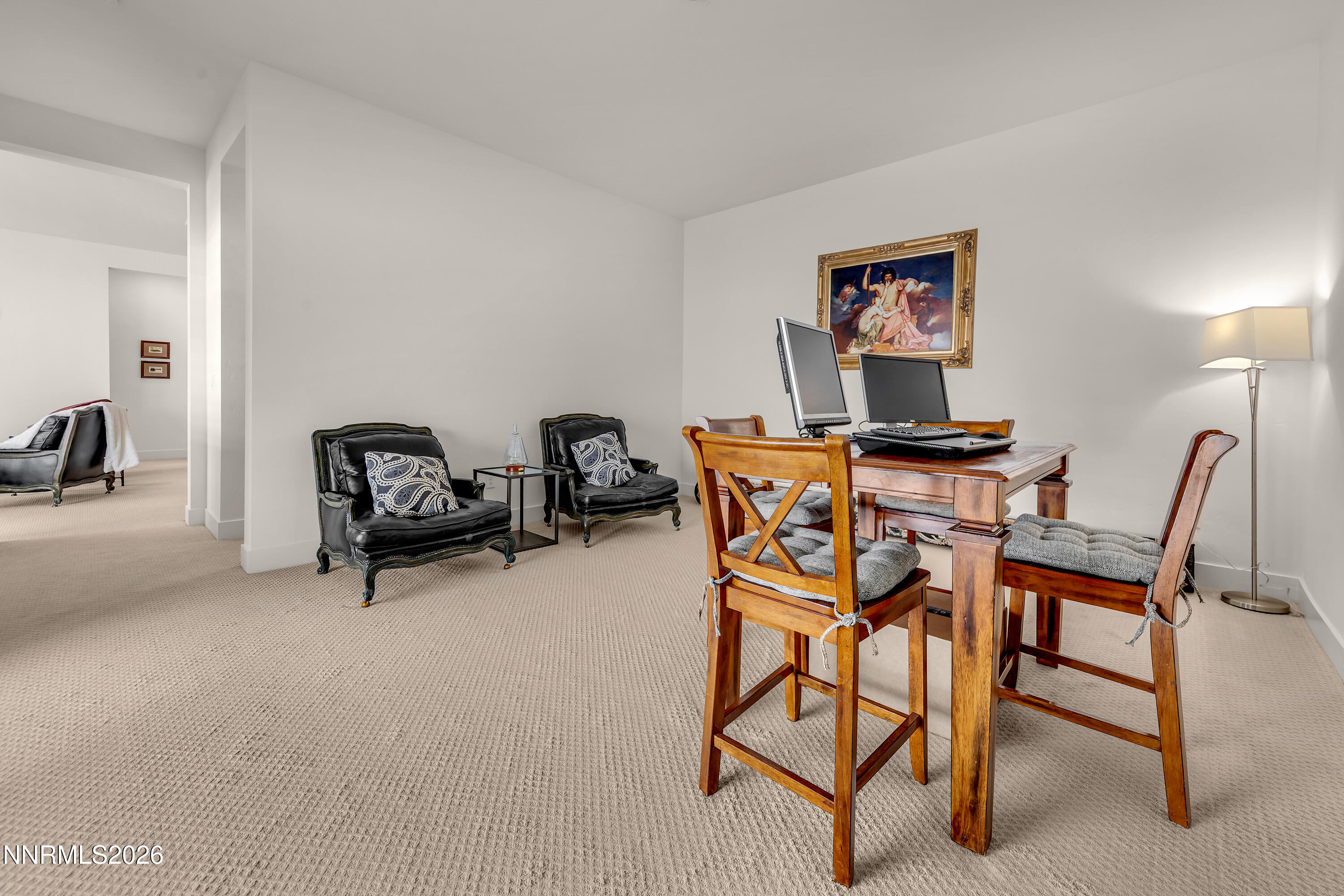 9109 Wild Skies Way Reno, NV 89523 - Photo 38 of 81 a dining room with furniture and a potted plant