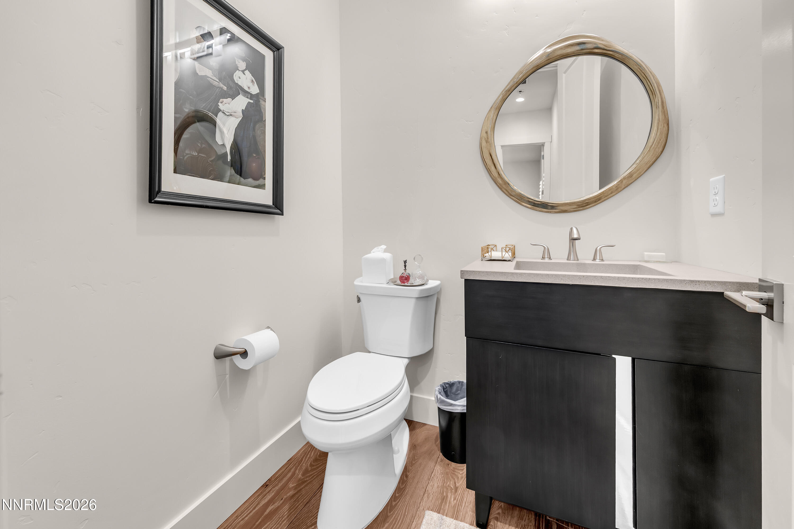 9109 Wild Skies Way Reno, NV 89523 - Photo 41 of 81 a bathroom with a toilet a sink and a mirror